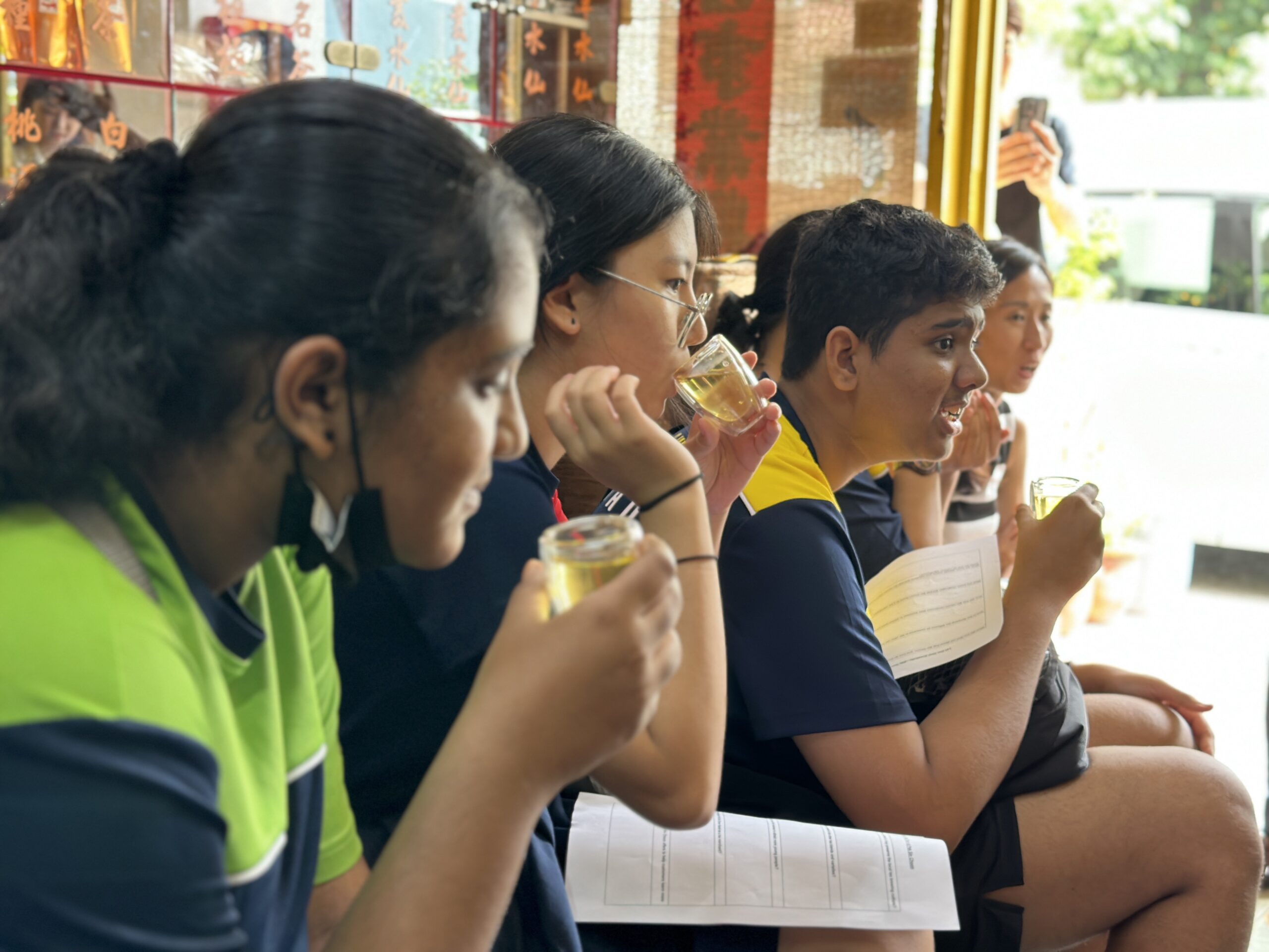 Students on a learning journey having discussions during a design thinking workshop
